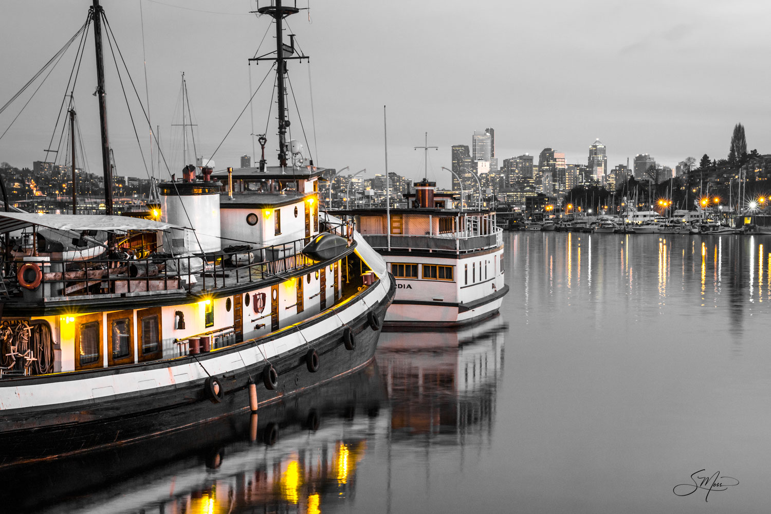Lake Union Lights Allow yourself to be pulled in to this beautiful, quiet scene on Lake Union as the sun sets with the boats settled in for the...